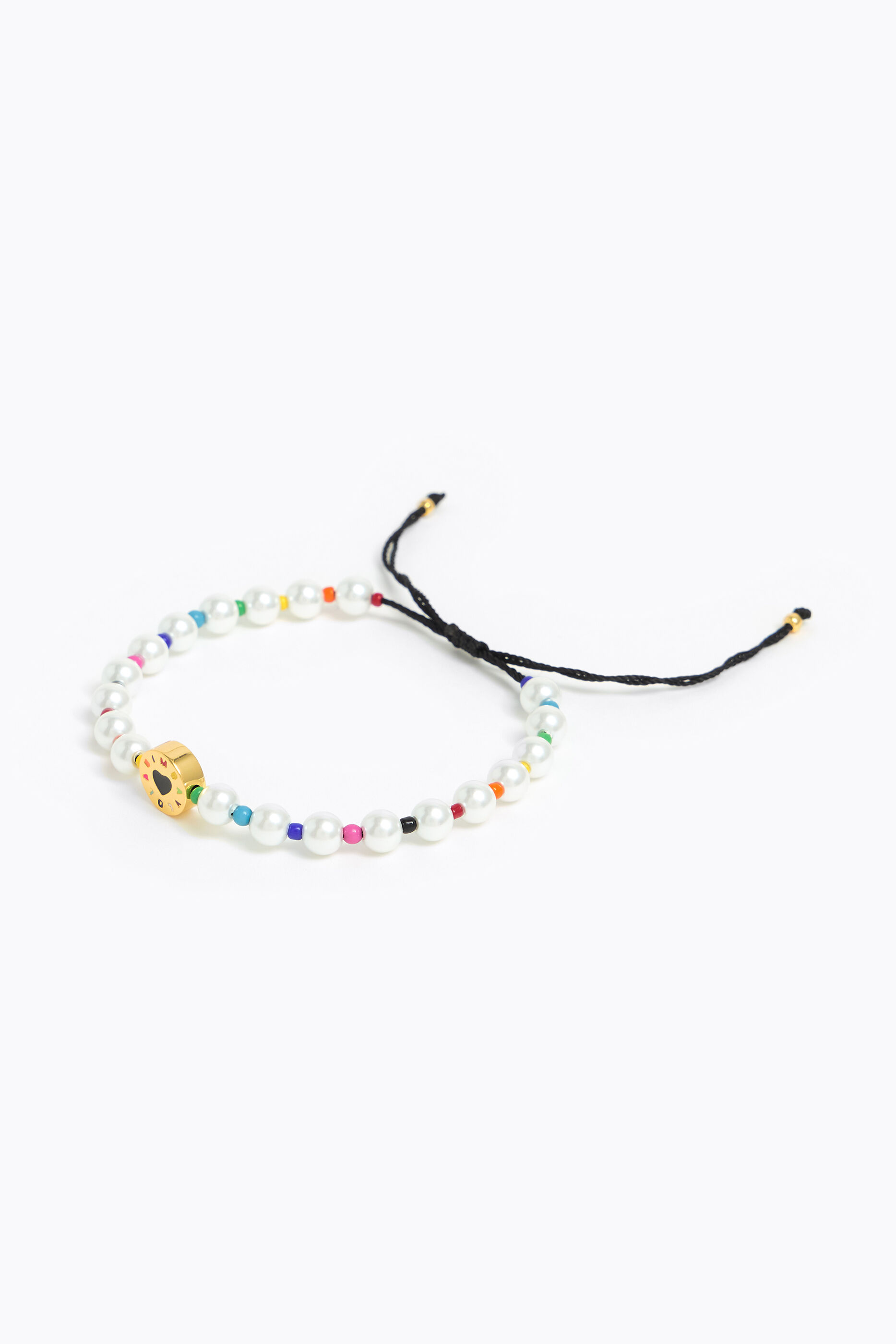 Pulsera perlas y abalorios
