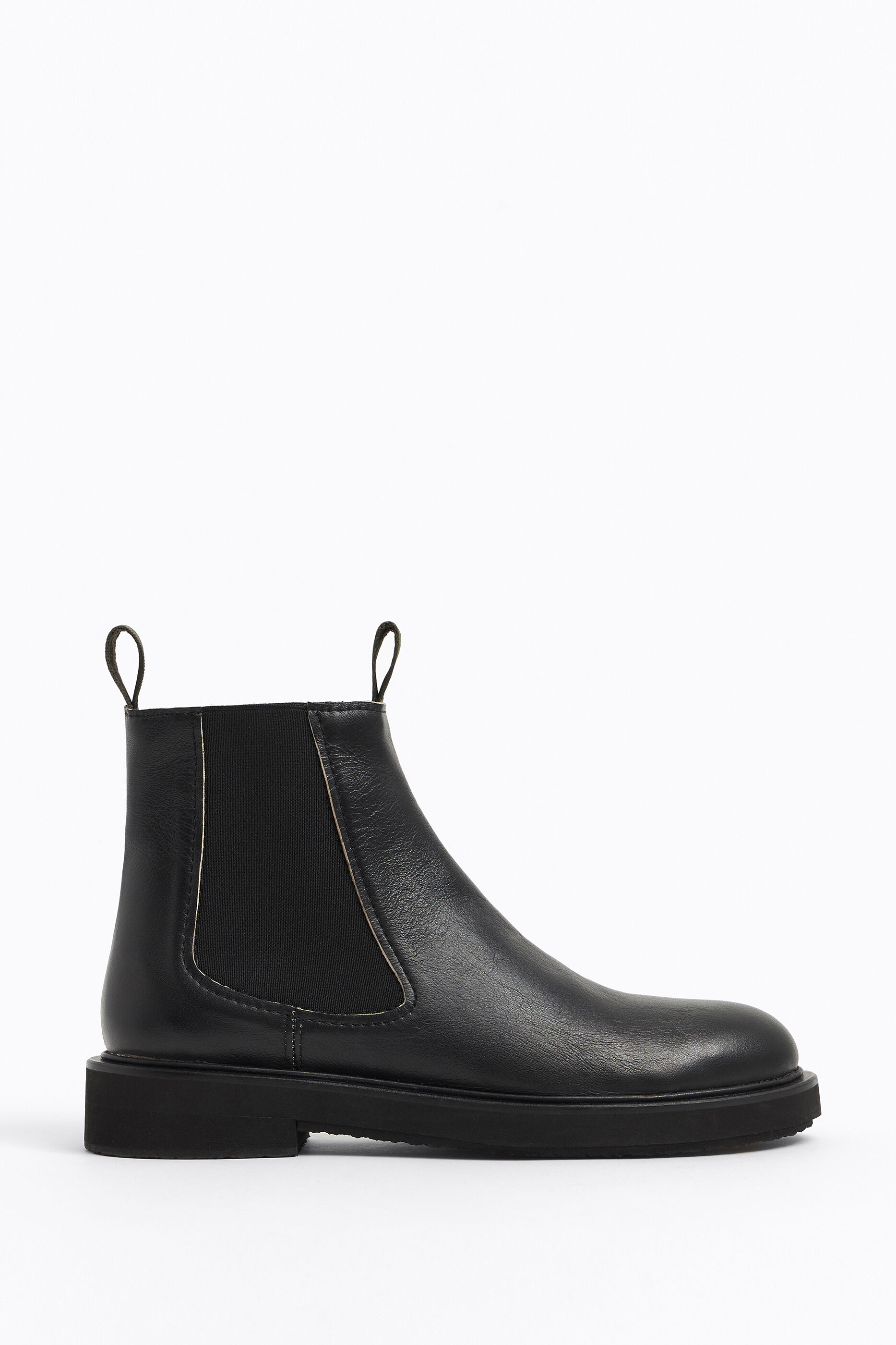 Botín Chelsea rústico negro