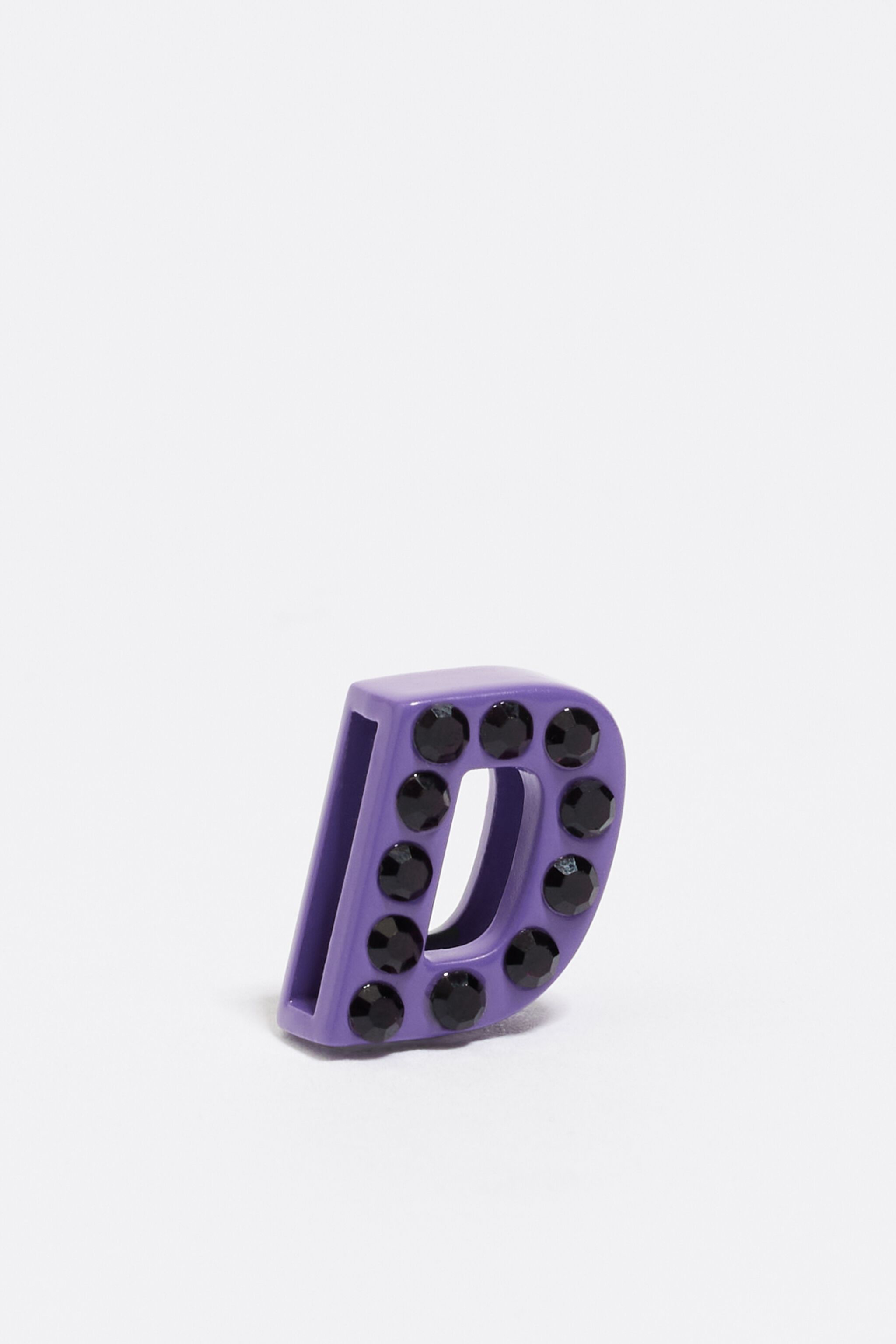 Violet letter D metal charm