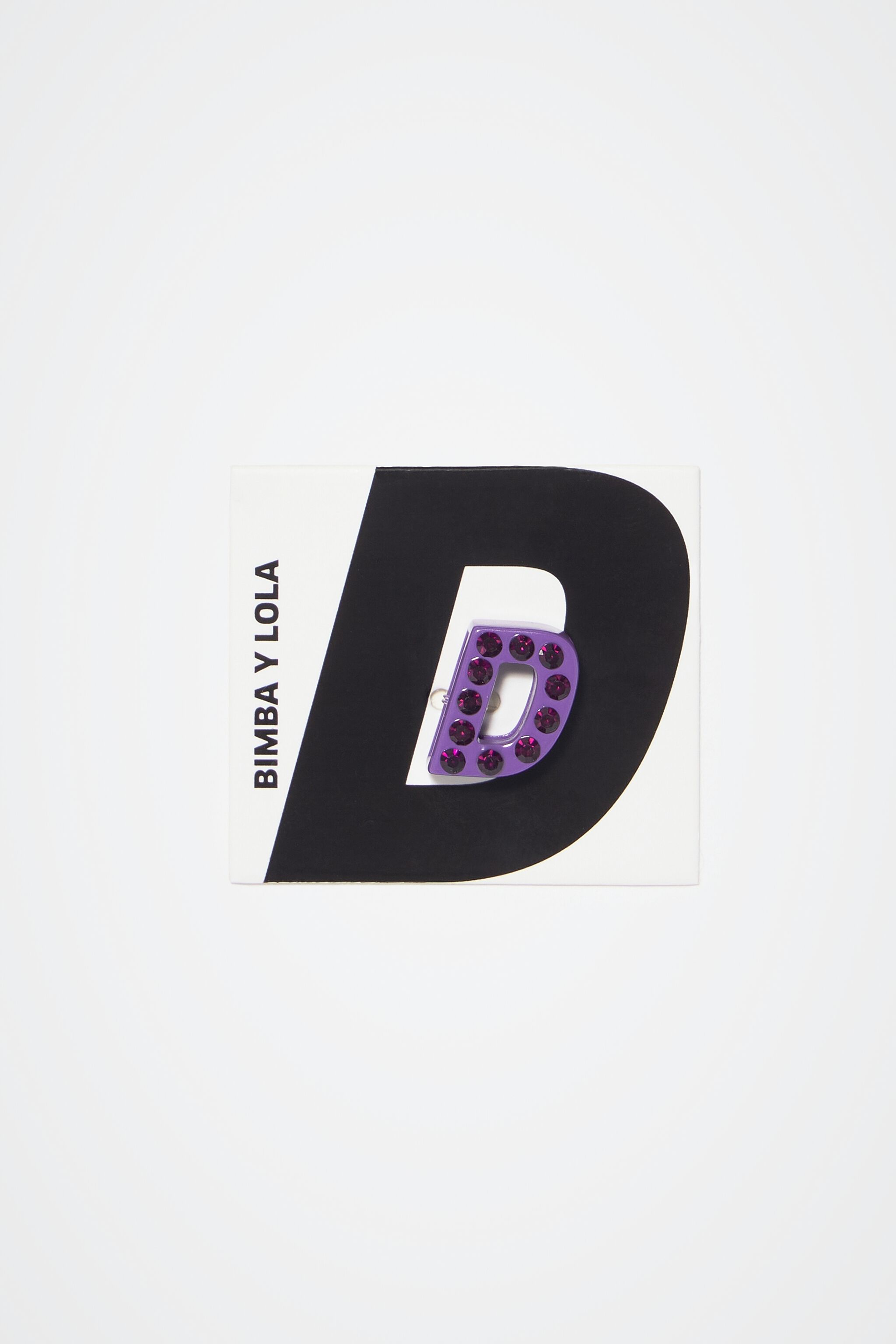 Violet letter D metal charm