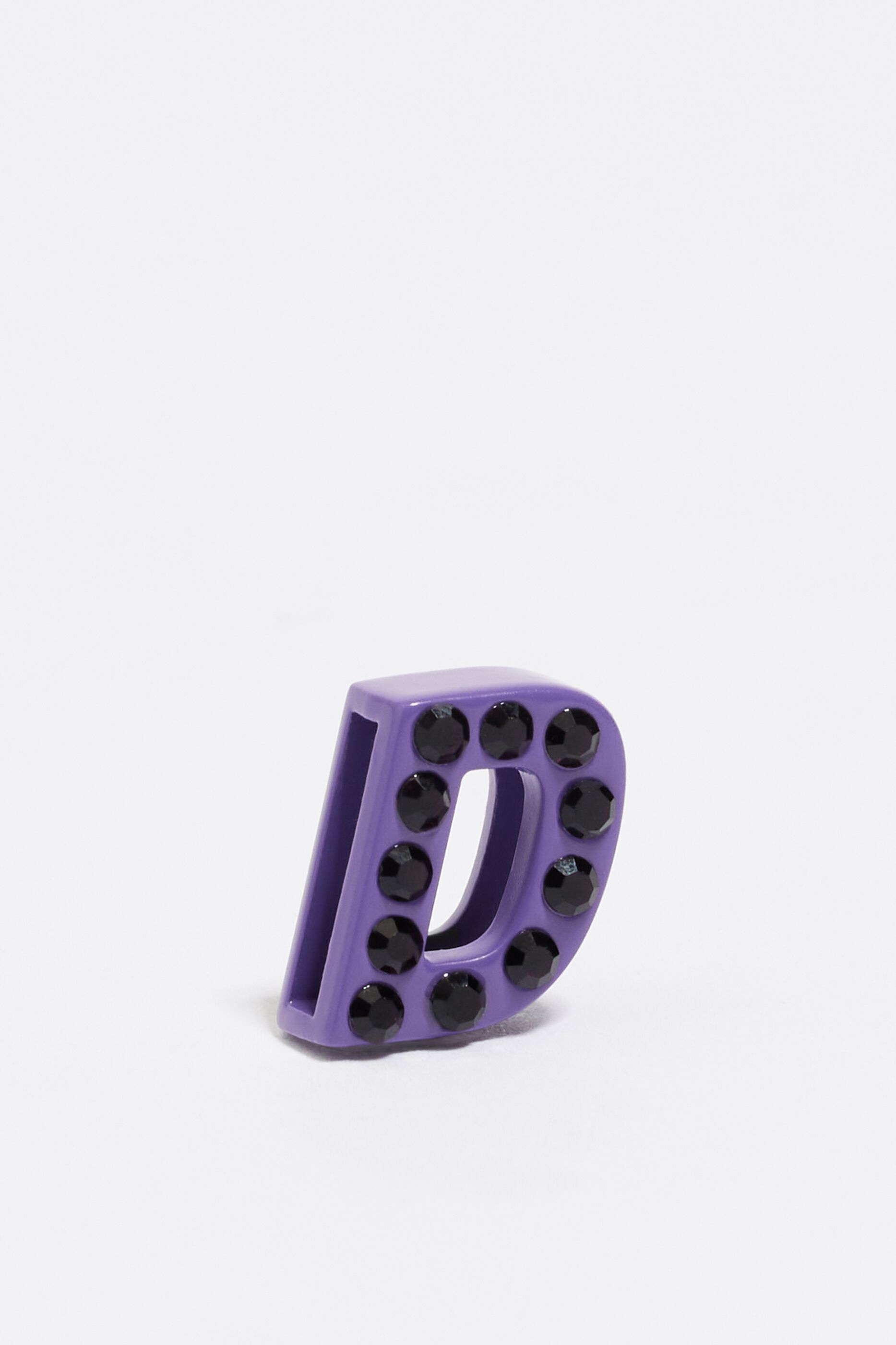 Violet letter D metal charm