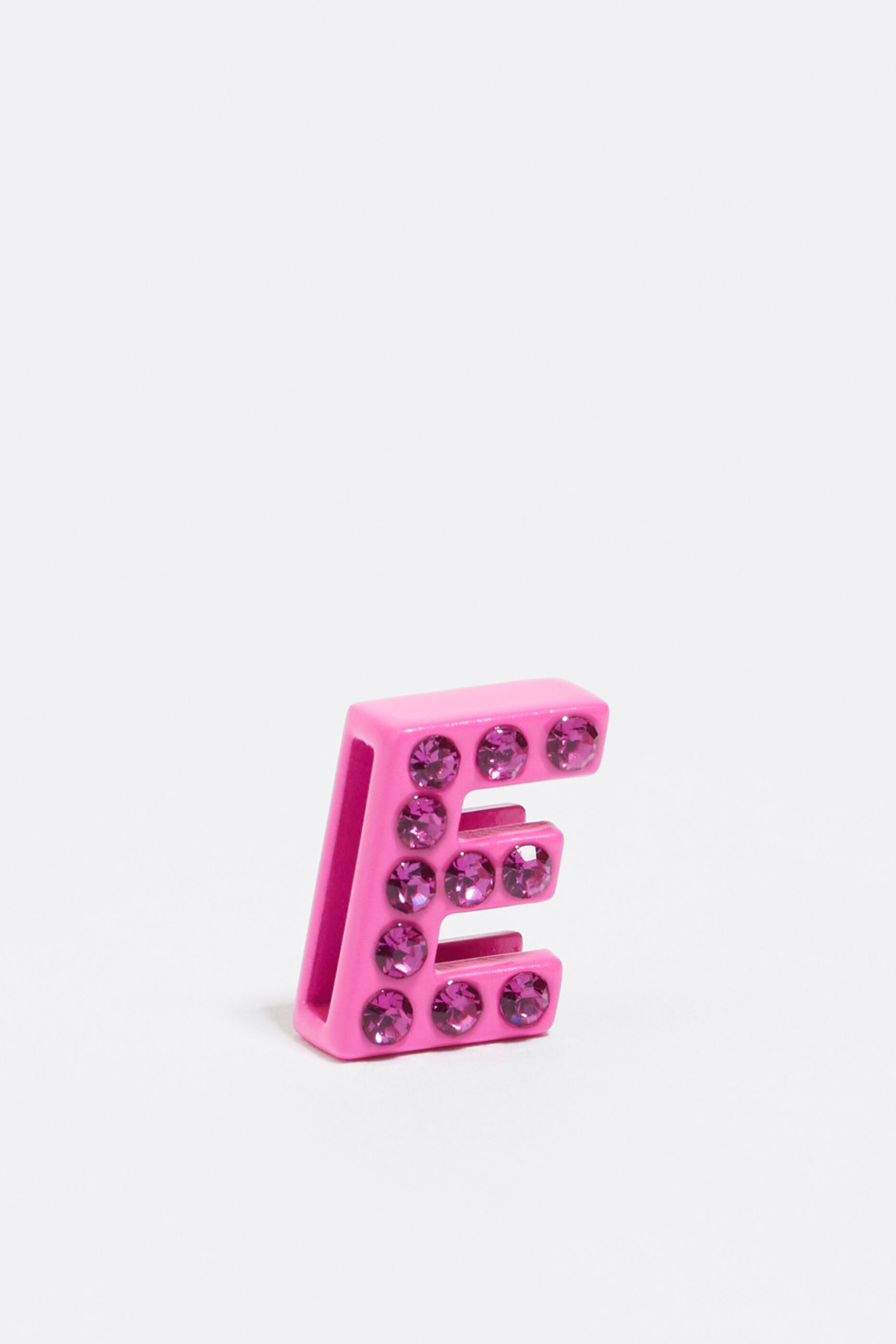Neon pink letter E metal charm