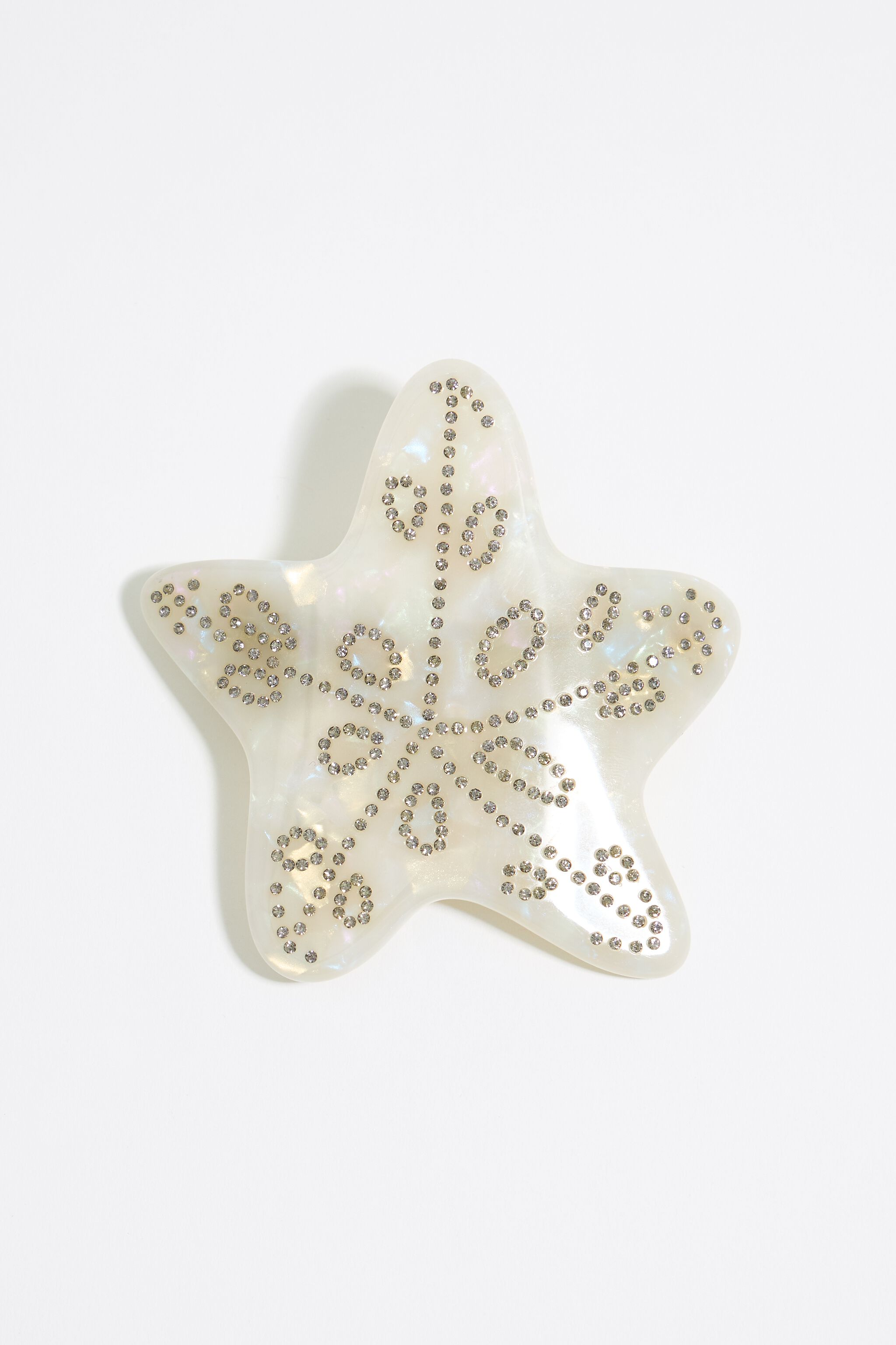 Horquilla estrella resina marfil
