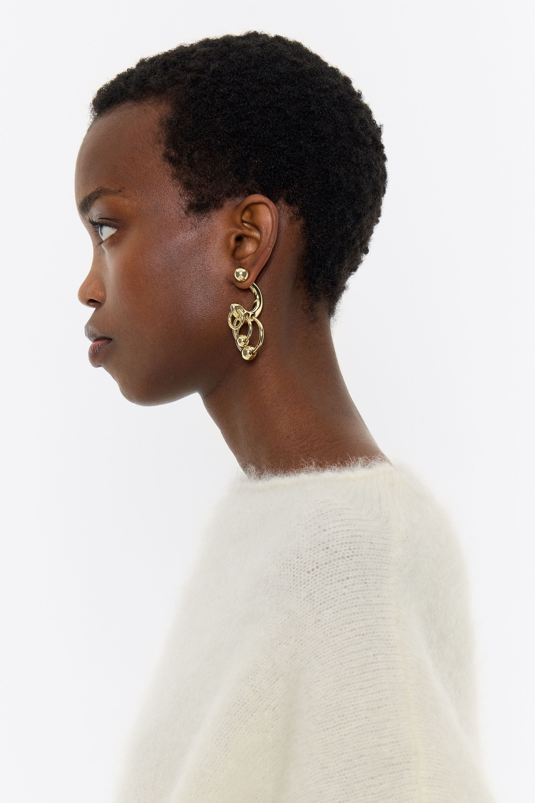 Gold hoop earring with rings