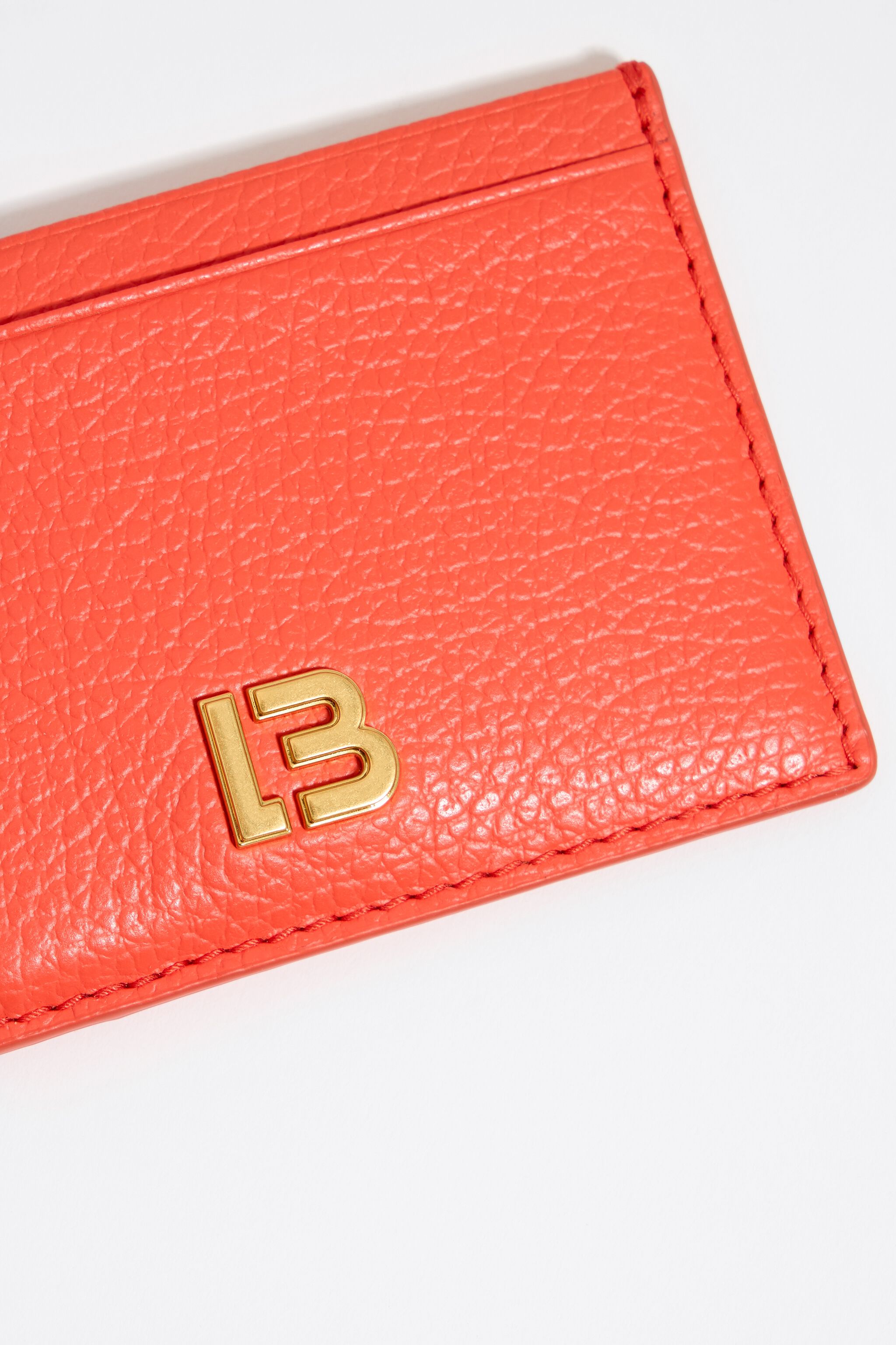 Tarjetero piel coral