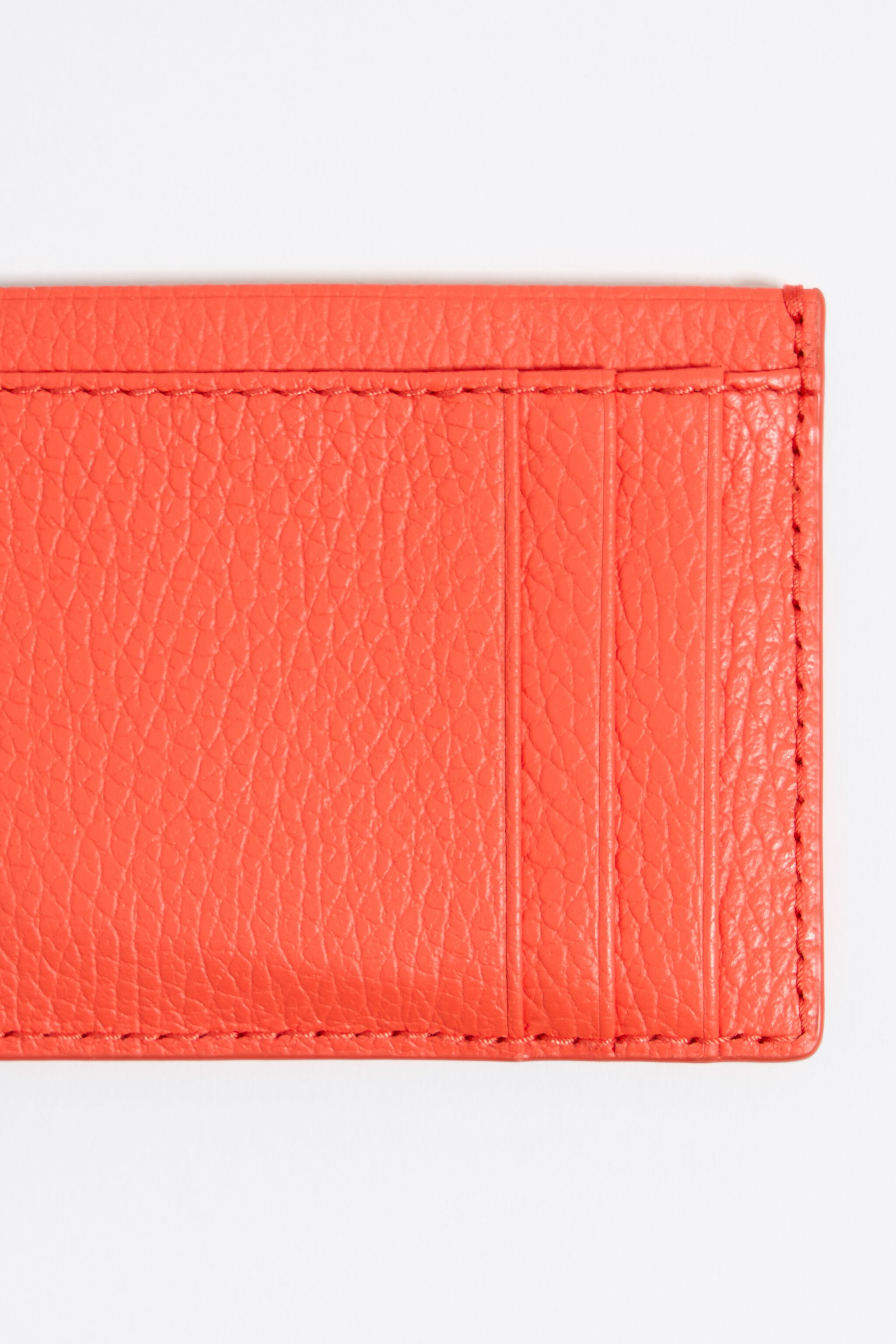 Tarjetero piel coral