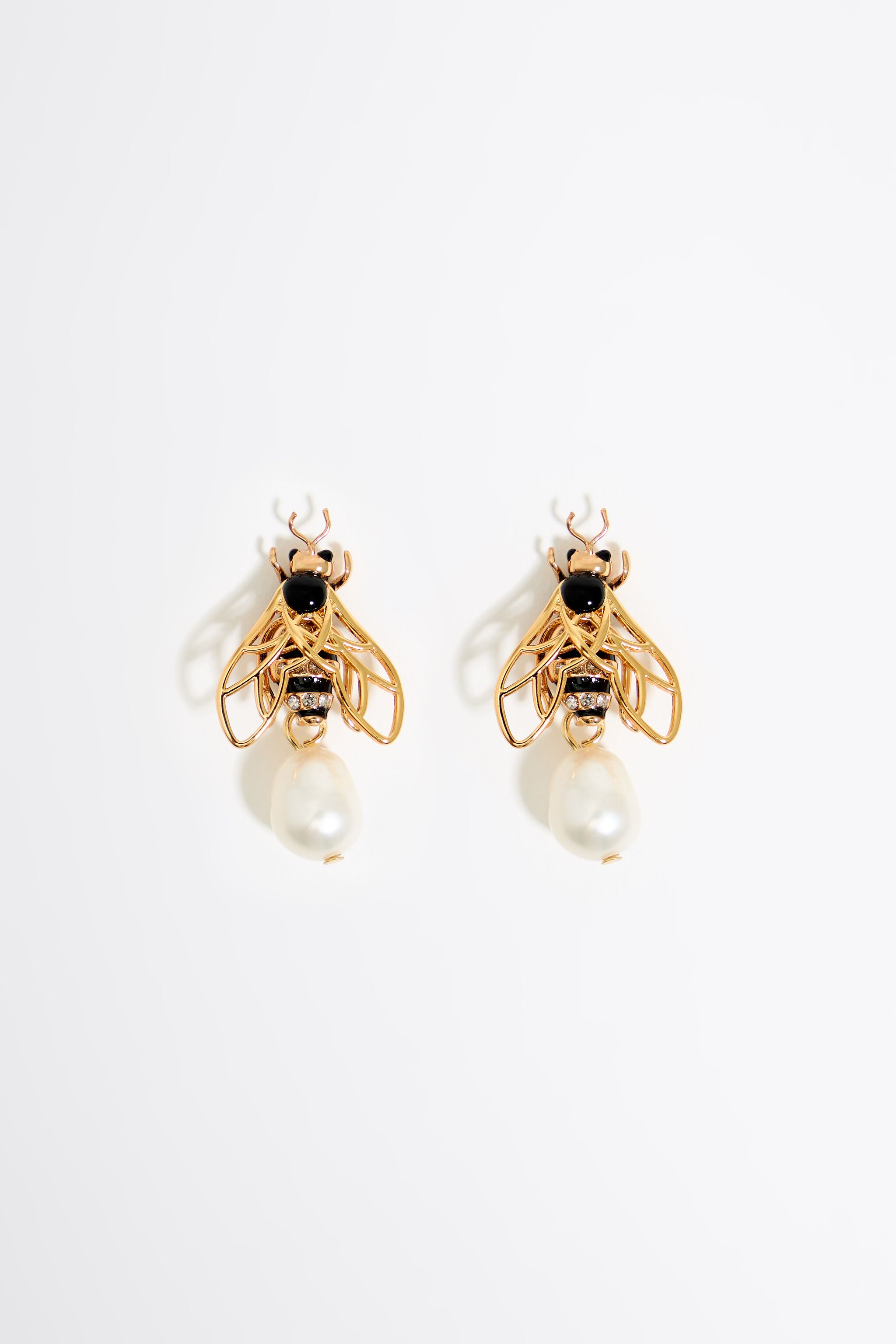 Gold bee and pearl earrings