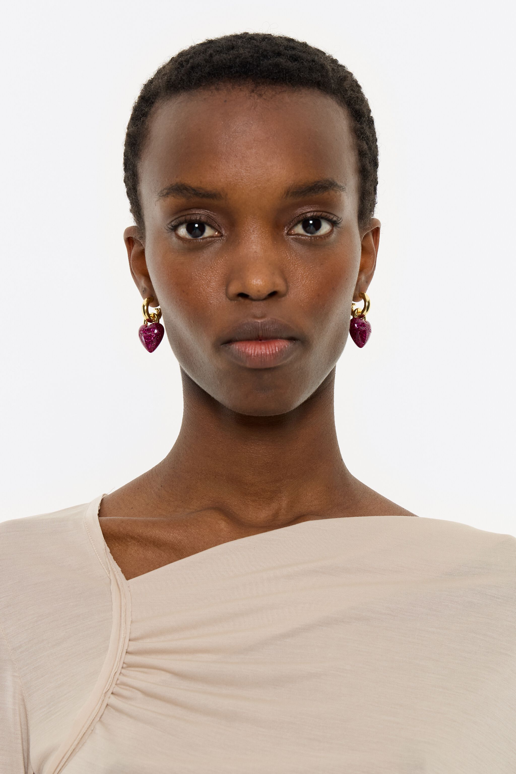 Heart hoop earrings with fuchsia glitter