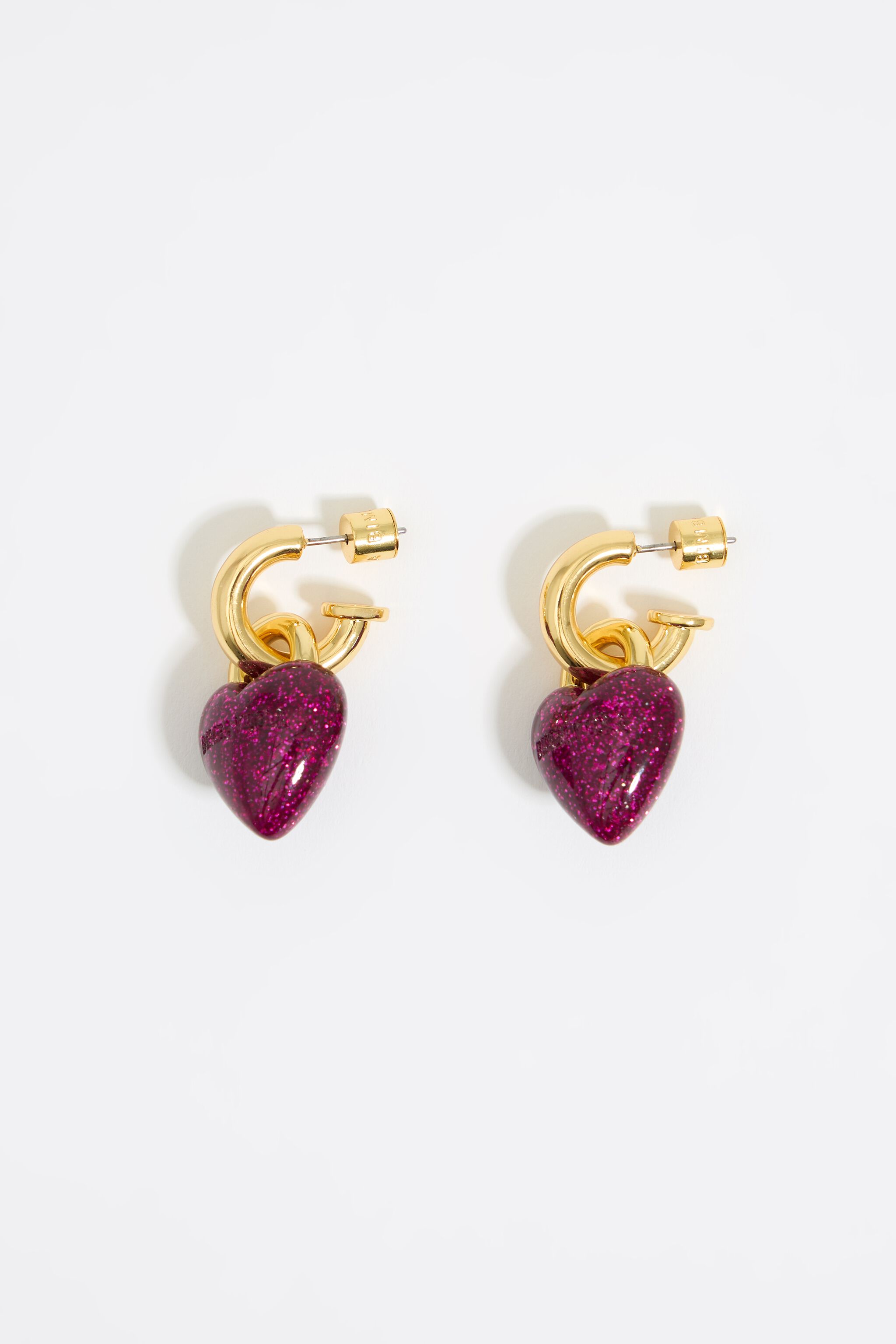 Heart hoop earrings with fuchsia glitter
