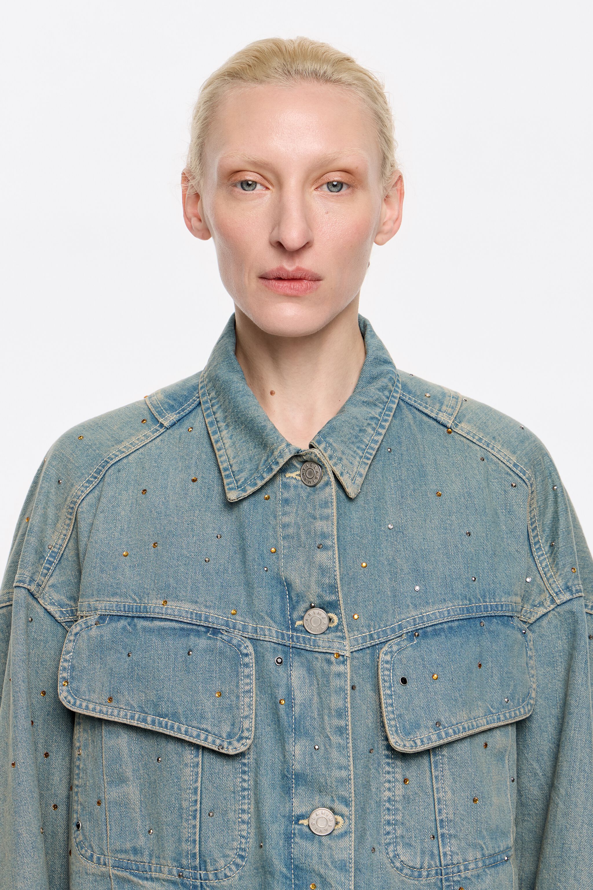 Light blue denim jacket with stones