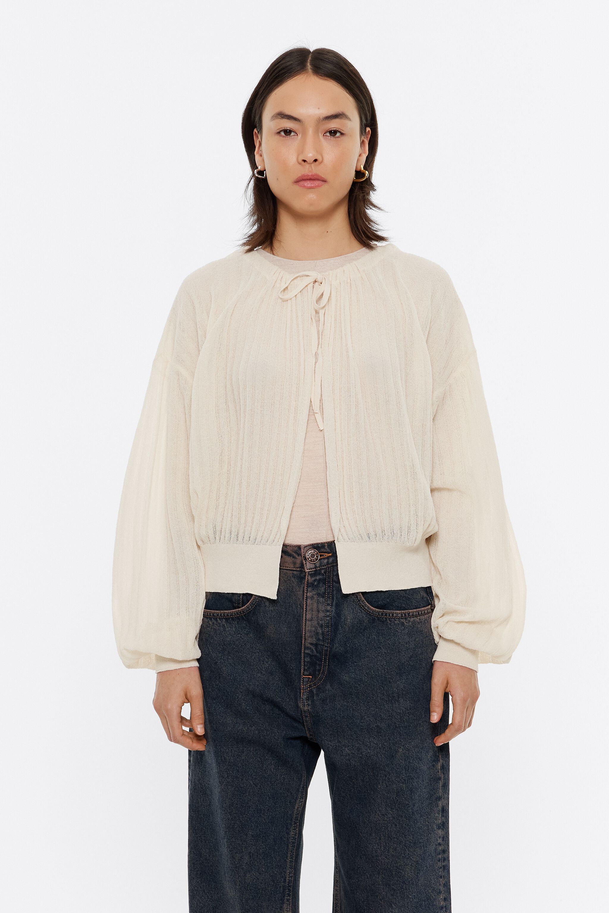 Ivory ruched cardigan with ties