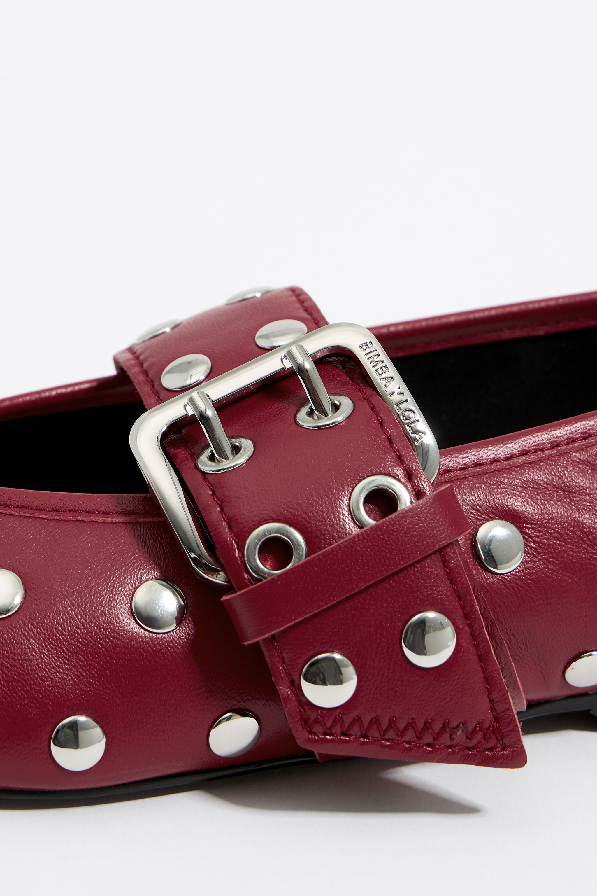 Studded red leather ballerina