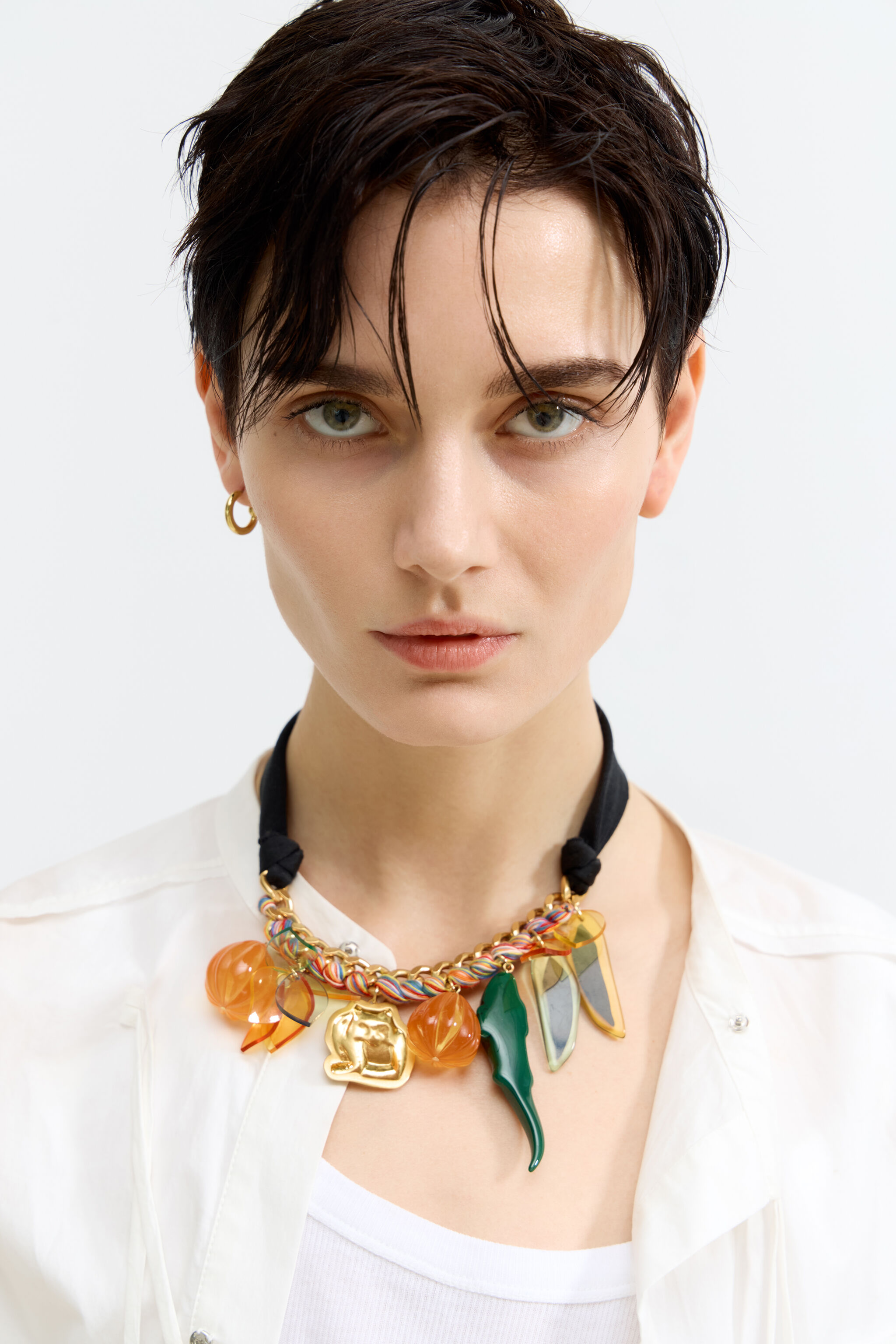 Chain and multicolor cord jungle charms necklace