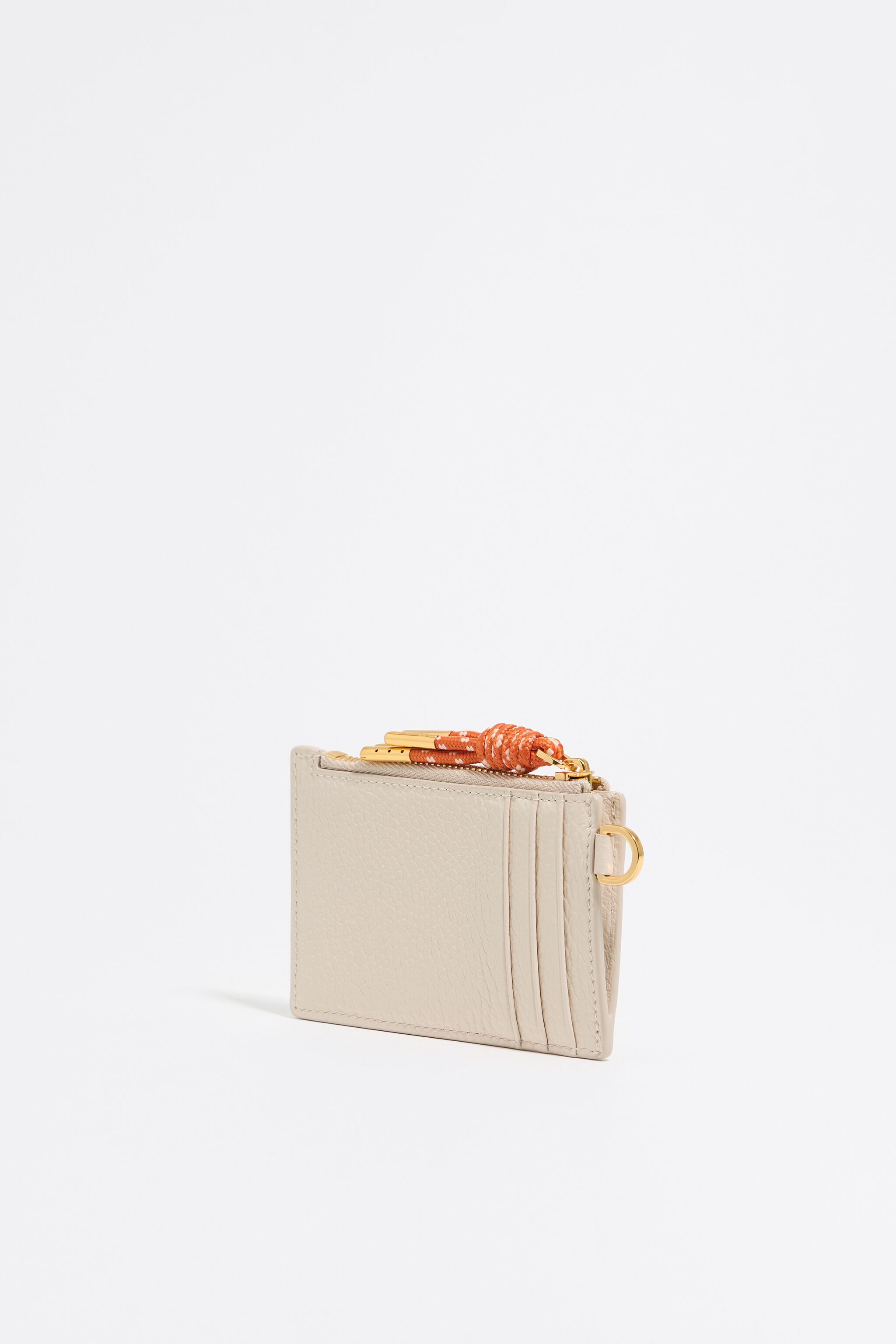 Off-white leather card holder
