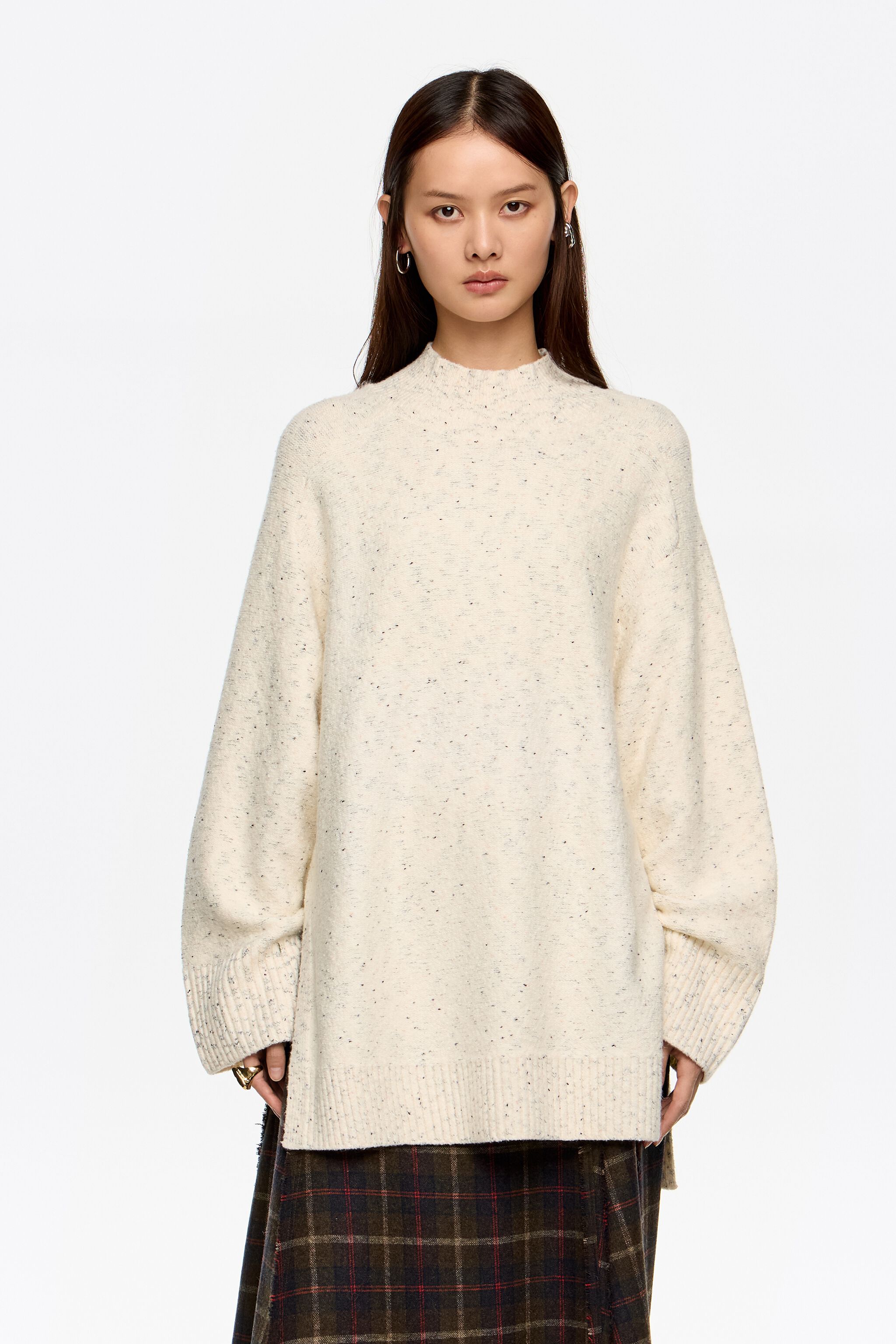 Ivory neps side slits sweater
