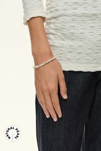 Pulsera perlas naturales logo ovalado