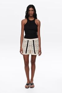 Short punto bicolor marfil