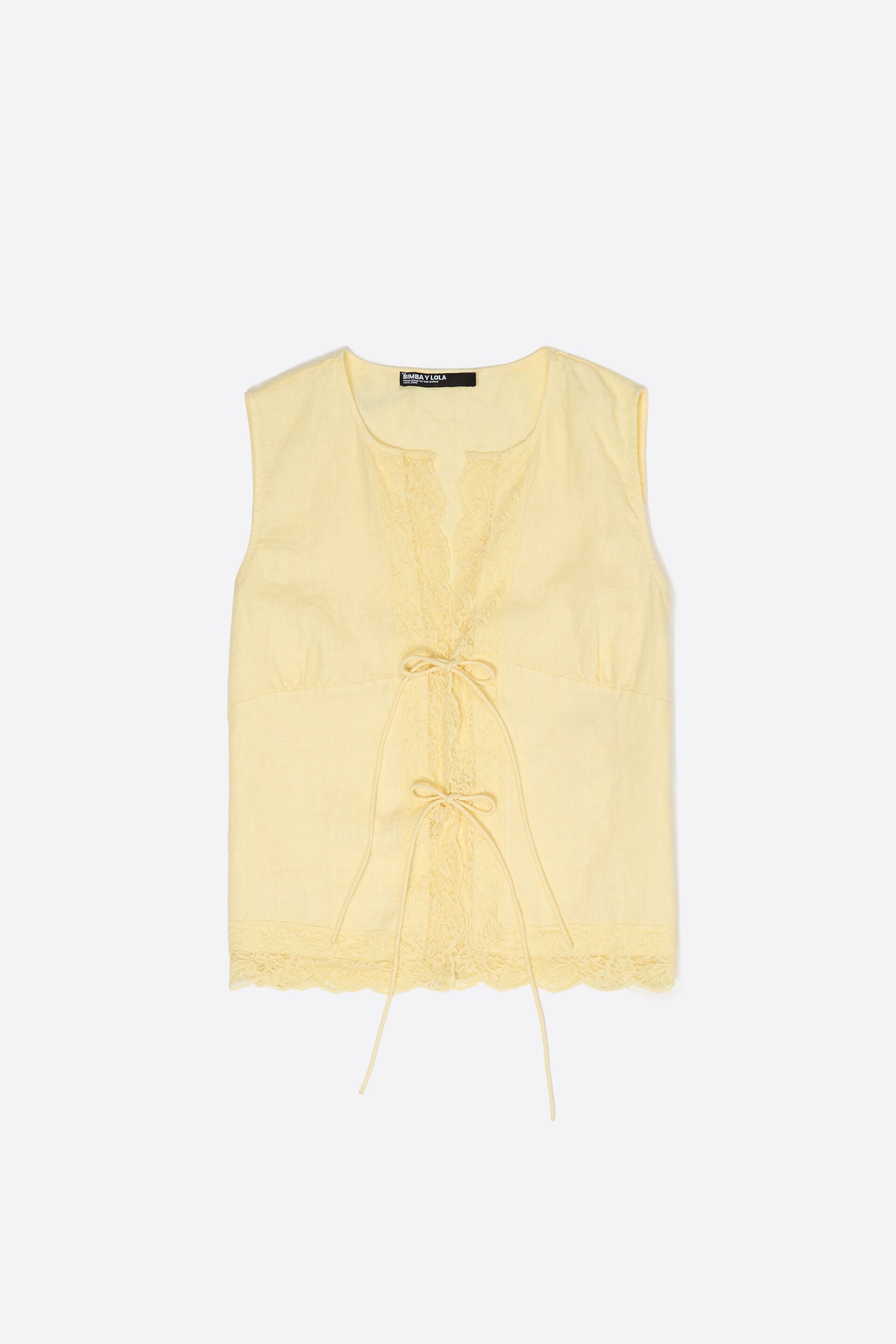 Yellow linen sleeveless shirt with lace and ties