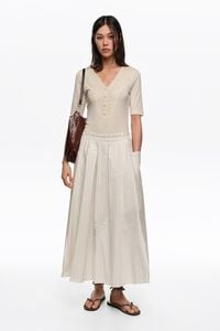 Falda l&iacute;nea A rayas marfil