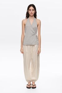 Metallic silver wrap top
