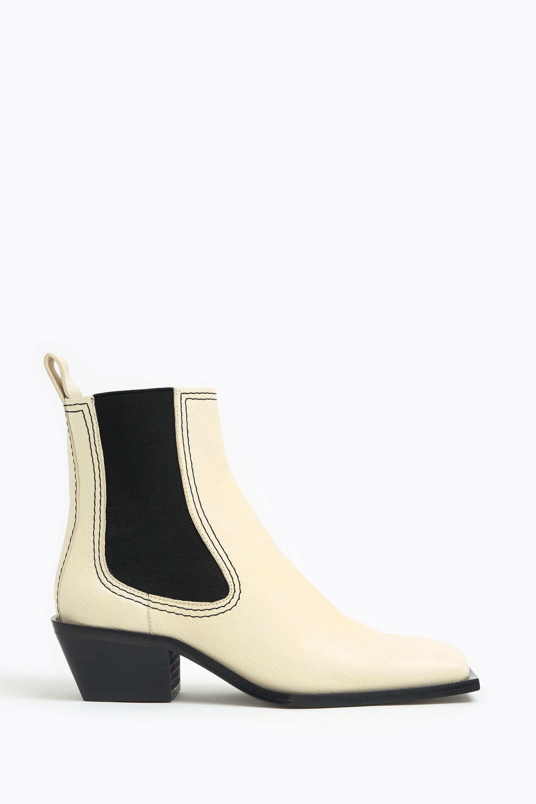 white leather flat ankle boots