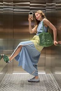 Sleeveless dress with blue striped overlay strap