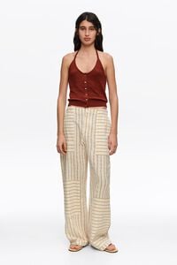 Ocher cotton patchwork jogger trousers with stripes
