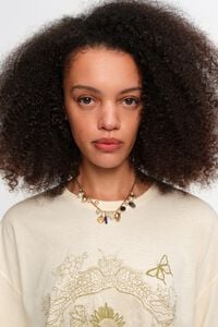 Aged gold necklace with shells and fish