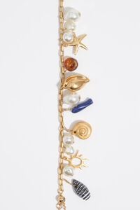 Pulsera perlas y caracolas dorado mate