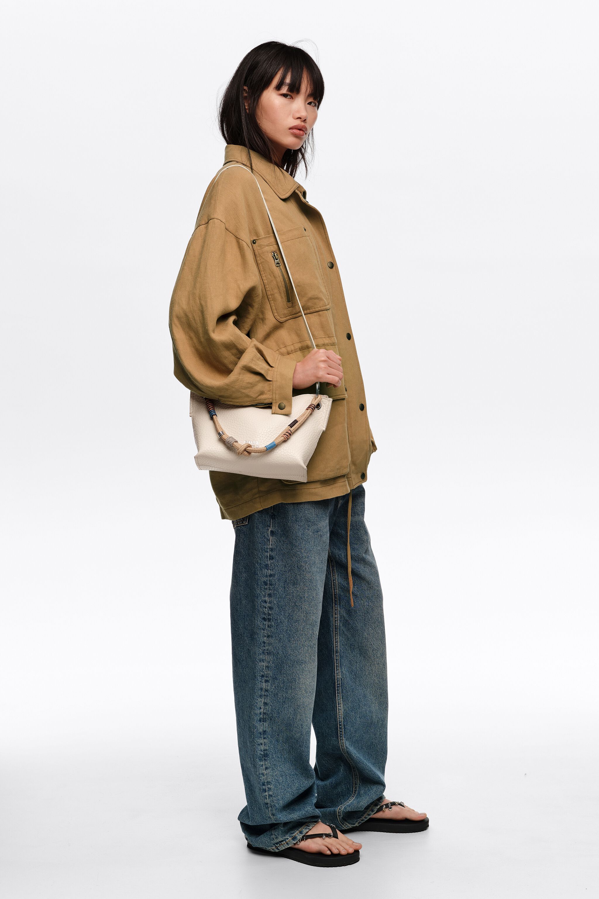 Medium off-white leather trapezium bag