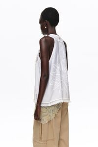 White fringed wrap top
