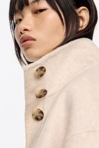 Chaquet&oacute;n doble faz l&iacute;nea A marfil