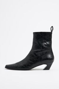 Black leather ankle boot heel