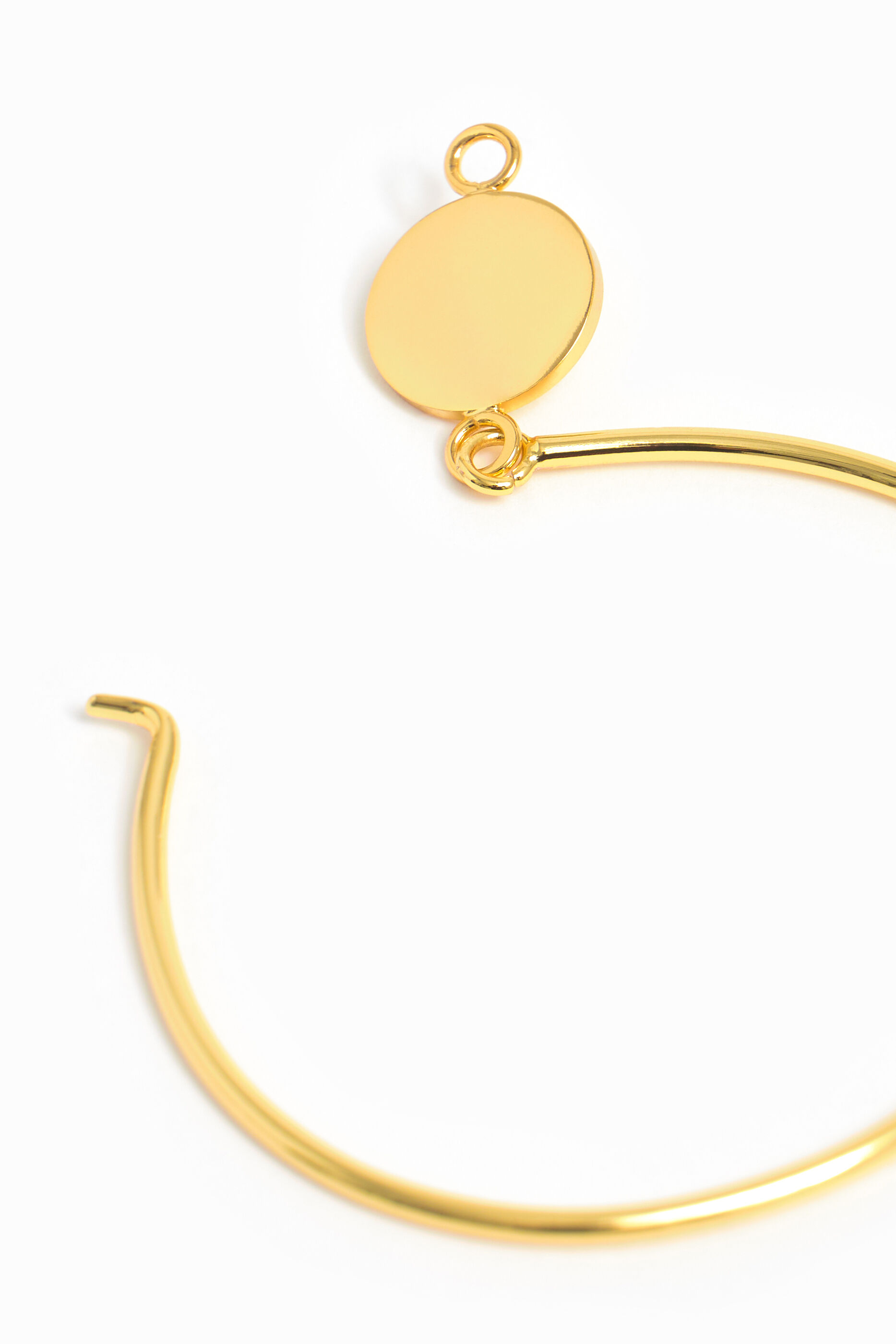 Pulsera rígida dorada