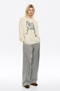 Camiseta oversize logo lazo vainilla