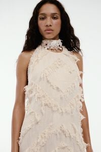 Ivory halter neck dress with fringing