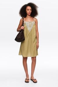Short green silk strappy dress