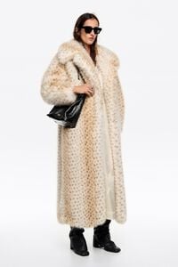 Long off-white fur coat