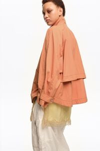 Short, orange fluid high neck trench