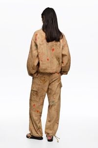 Underwater cropped jacket with stitching and patches