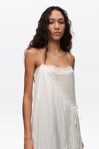 Vestido pantal&oacute;n encajes blanco roto