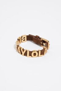 Bracelet avec logo dor&eacute; et lani&egrave;re en cro&ucirc;te de cuir marron