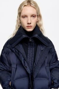 Navy blue down jacket with maxi knit neck