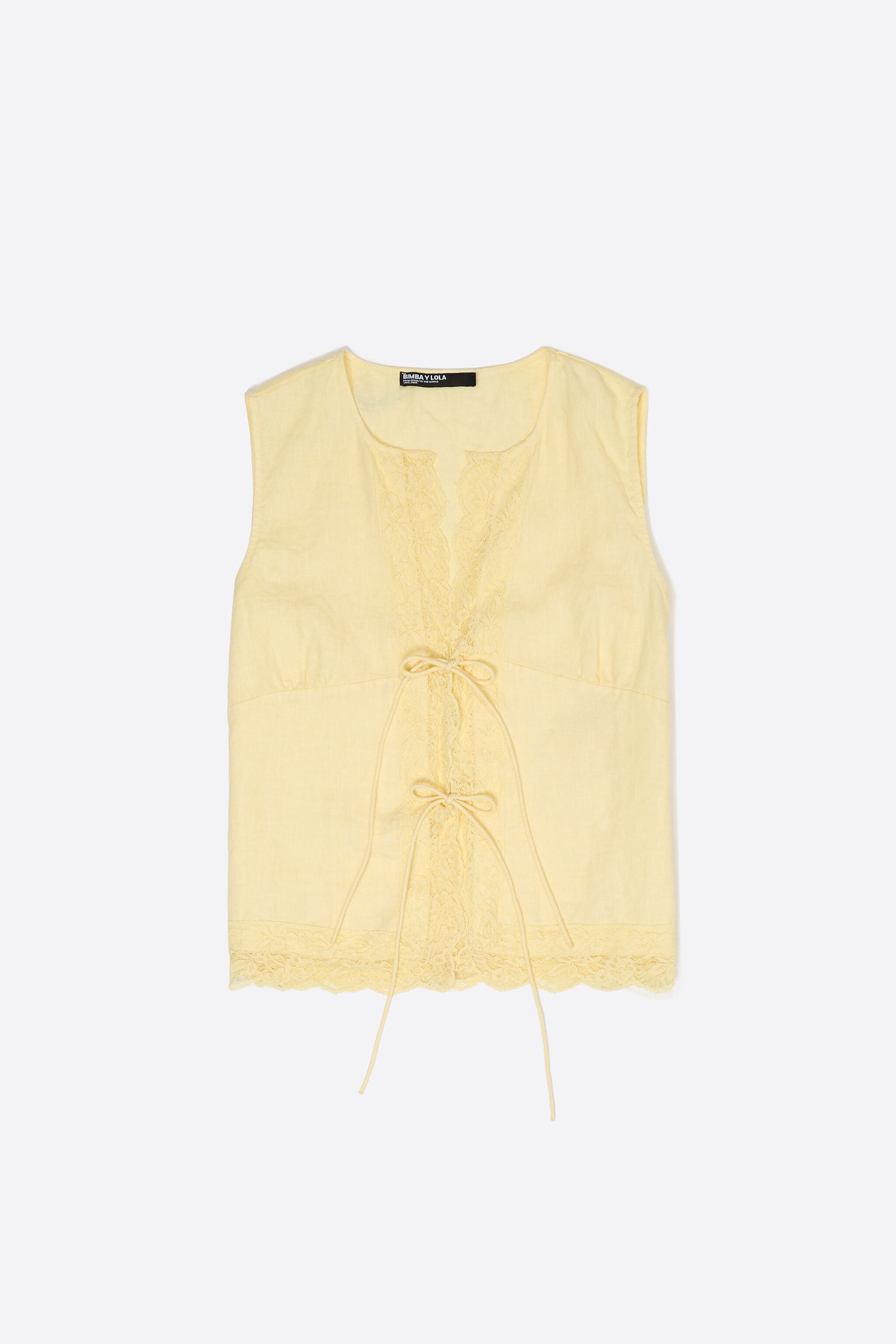 Yellow linen sleeveless shirt with lace and ties