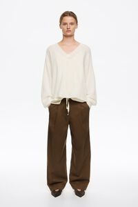 Pantal&oacute;n carrot pinzas oliva