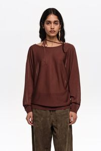 Brown boat neckline crossover ties sweater