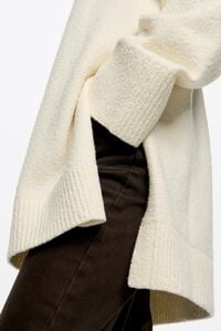 Long ivory cotton sweater