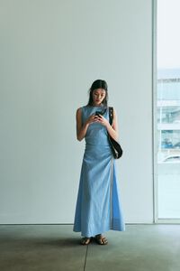 Sleeveless dress with blue striped overlay strap