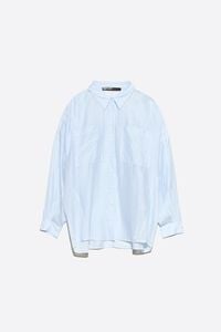 Light blue oversize shirt with mini rivets and stripes