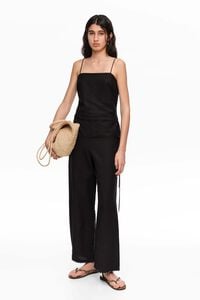 Black jumpsuit with adjustable waist and stones